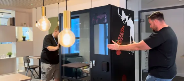 Installing a custom-wrapped machine at Rhodaus Court